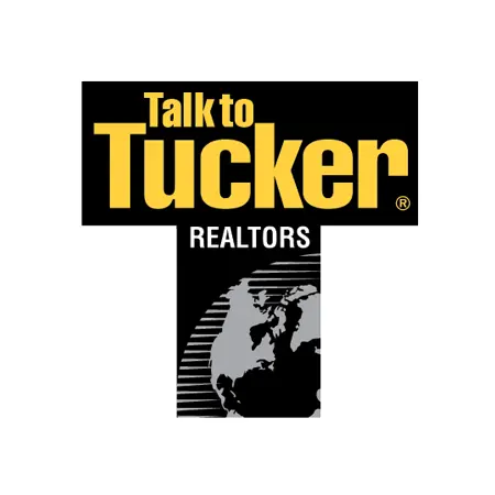 Logo for 'Talk to Tucker REALTORS' with yellow text on a black background.