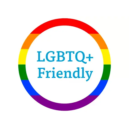 Rainbow circle with 'LGBTQ+ Friendly' text on a white background