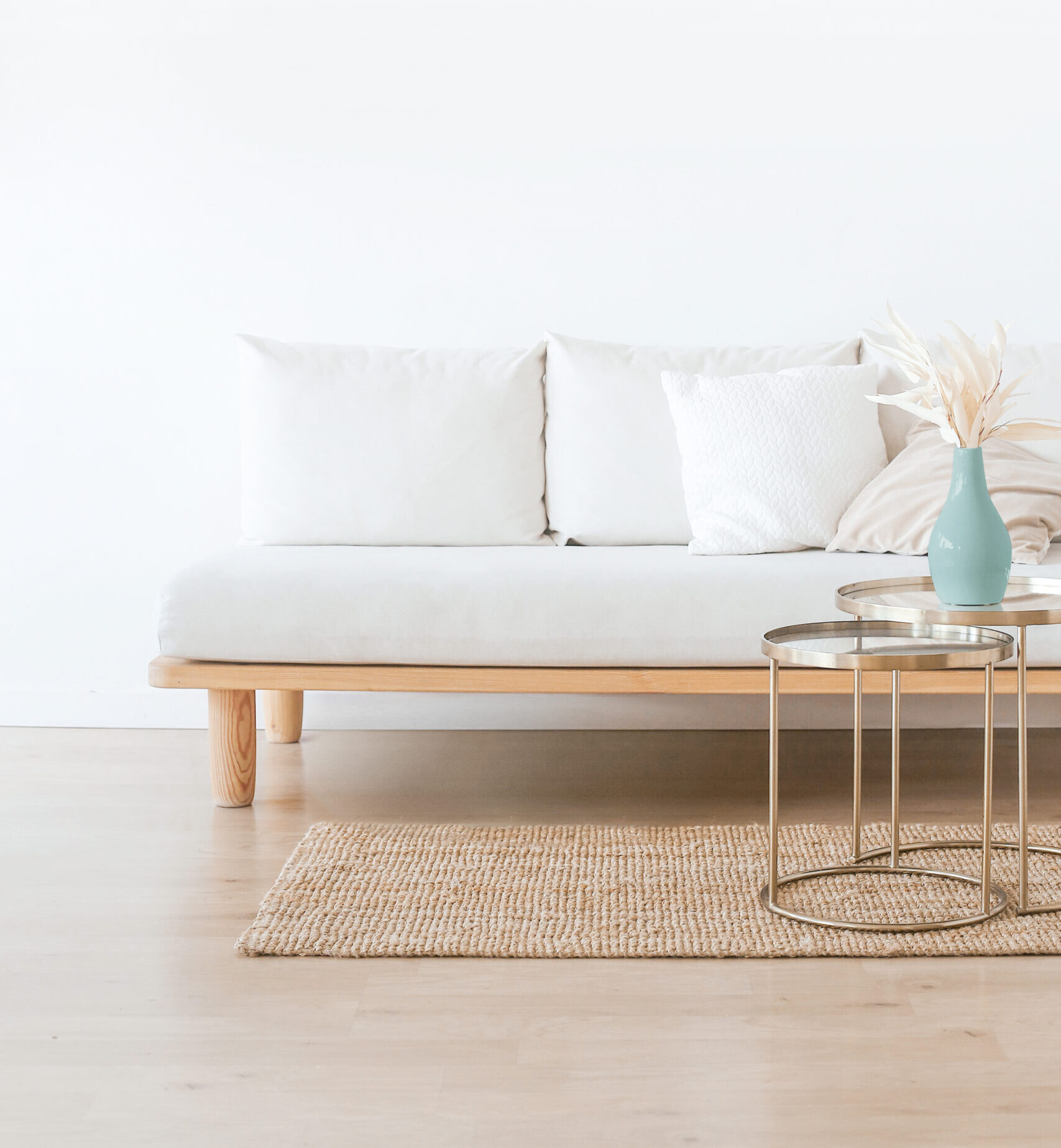 white couch on wooden floor